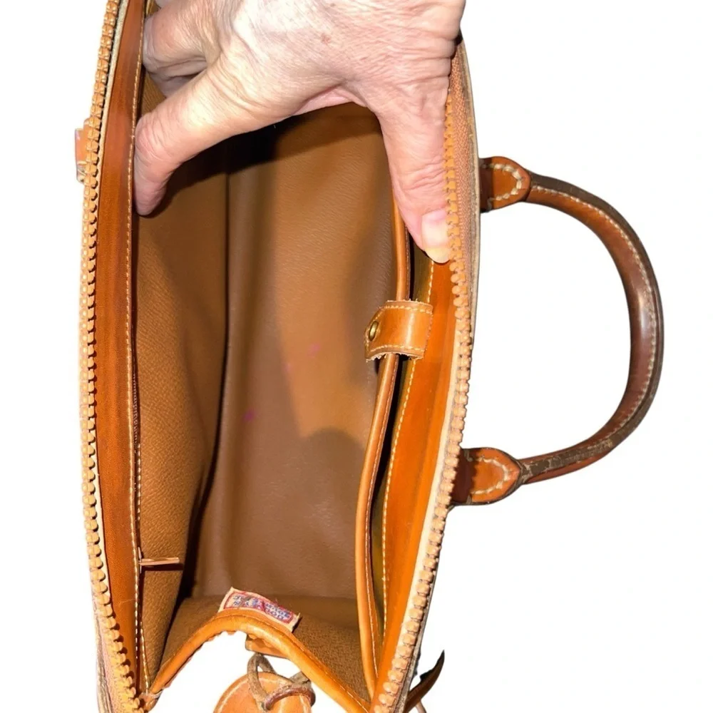 Dooney & Bourke All Weather Handbag Satchel Pebble Grain Black and Tan, 1980s